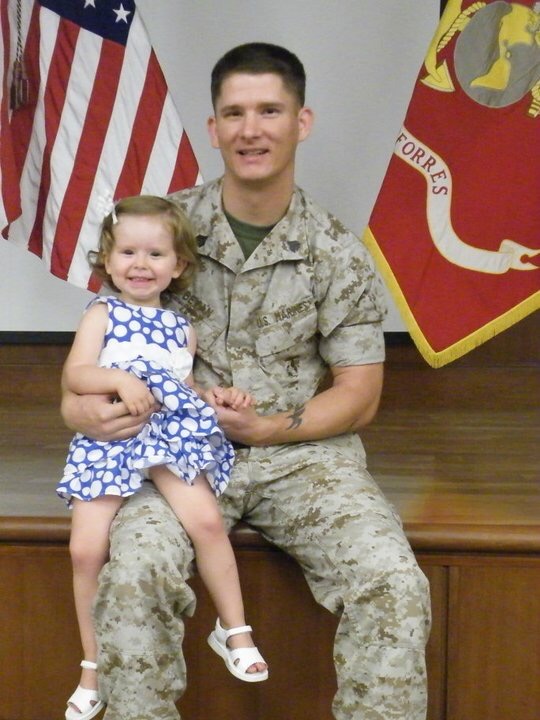 Russell with his child