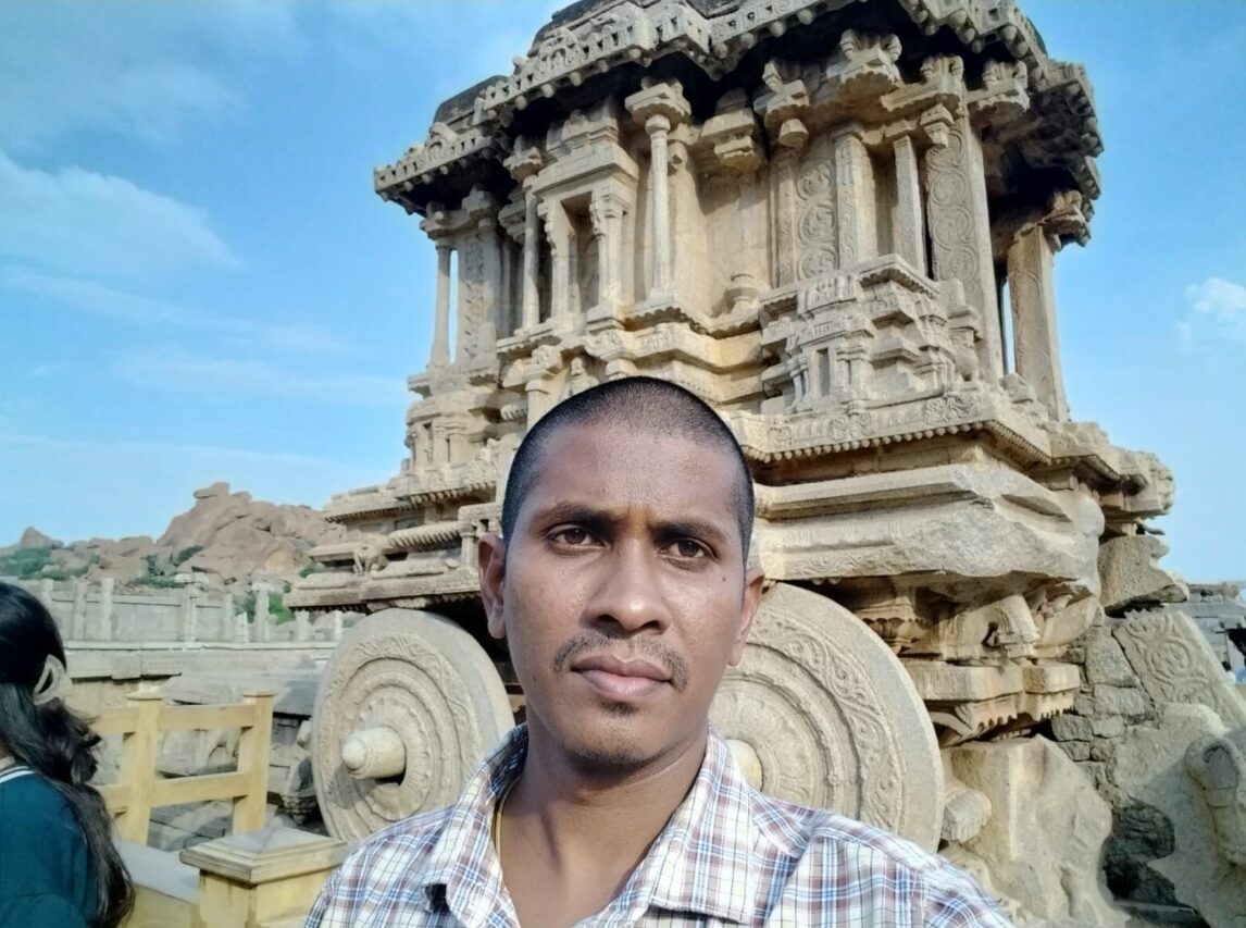 man in front of temple