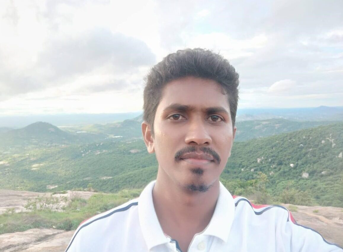 man overlooking mountain